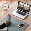 Online training at home with laptop and smartphone Online training at home with laptop and smartphone